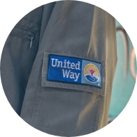 Person wearing United Way badge