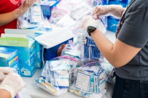 volunteer packing hygiene kit