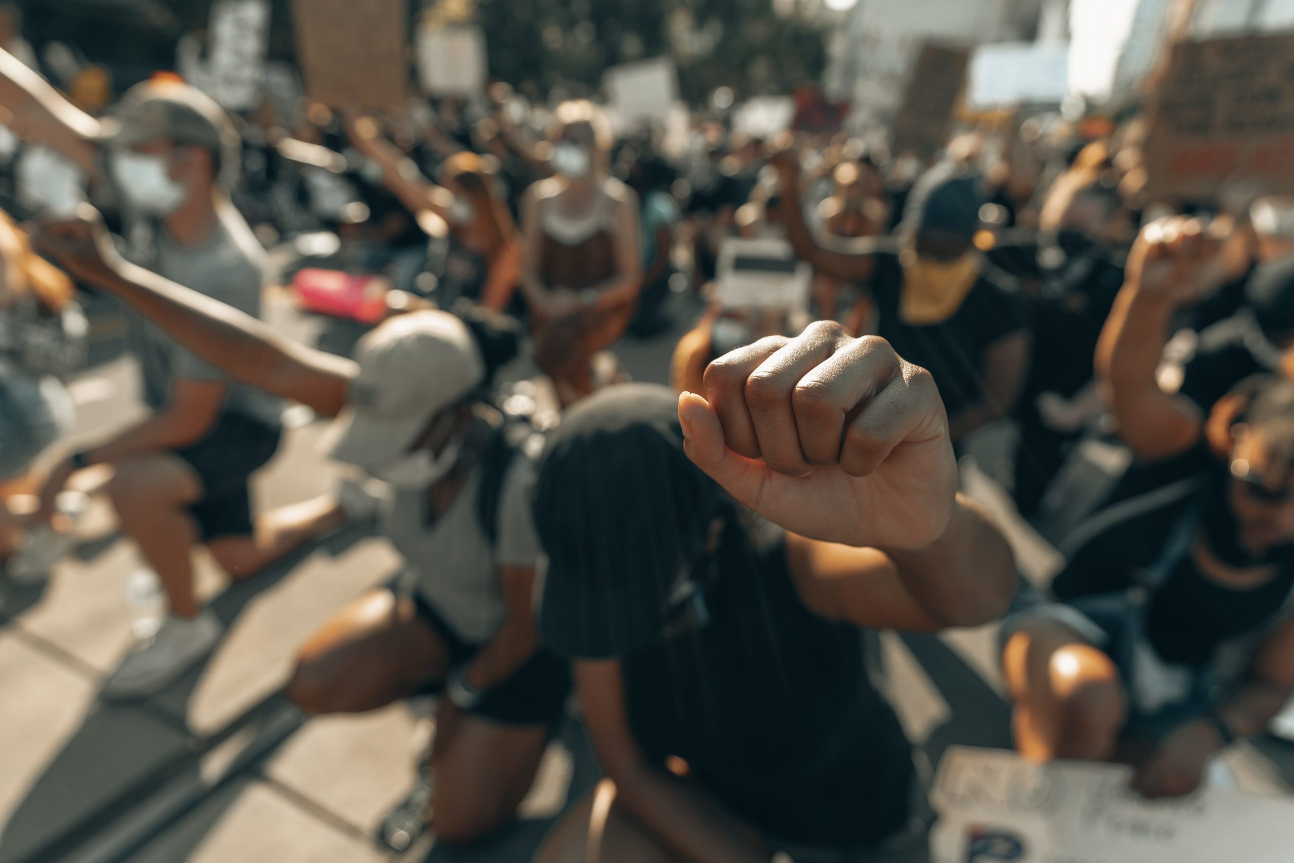 black women with fists raised