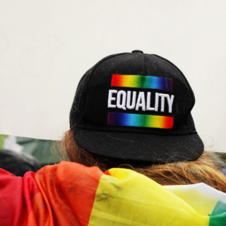 hat that says equality on it