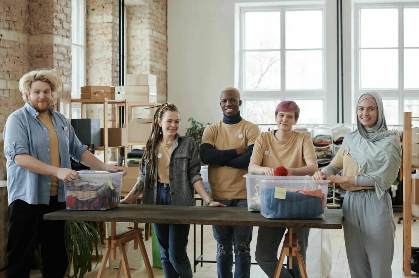 a group of diverse volunteers helping at a nonprofit